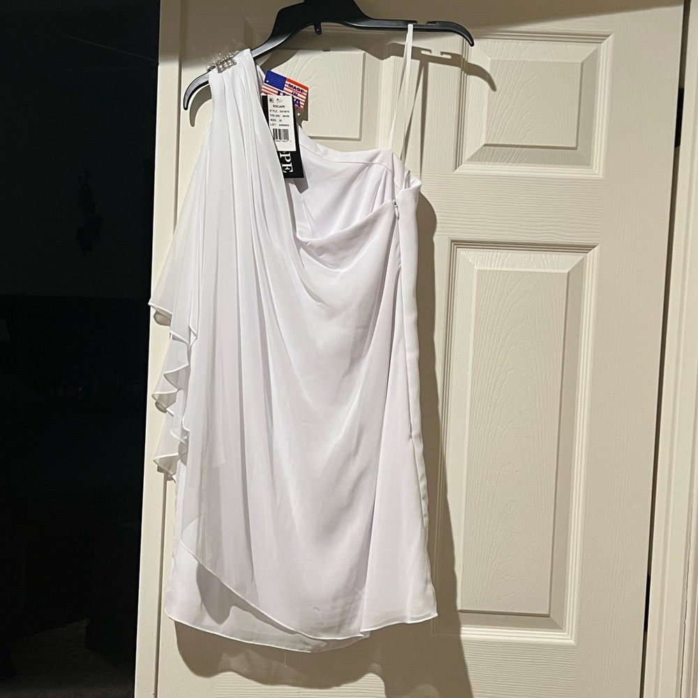 Never worn, mid-length, white dress with tags